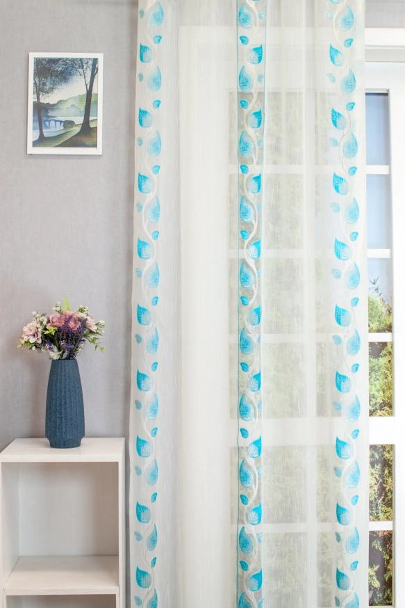 Türkiz leveles, szálbeszövéses, nyírt voile függöny organza betéttel UN-L-5