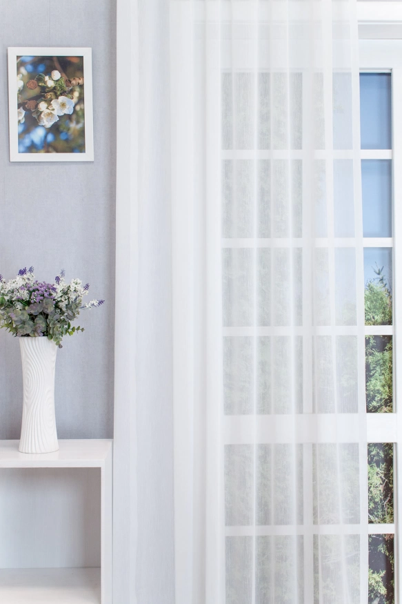 Ecrü színű sablet fényáteresztő függöny, ólomzsinóros 21124/300-102