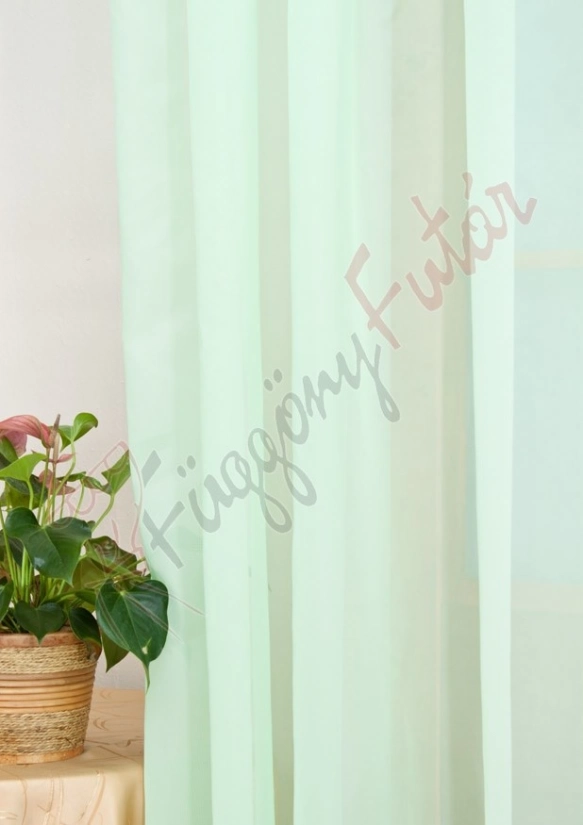 Halványzöld egyszínű voile függöny 11101/300/25
