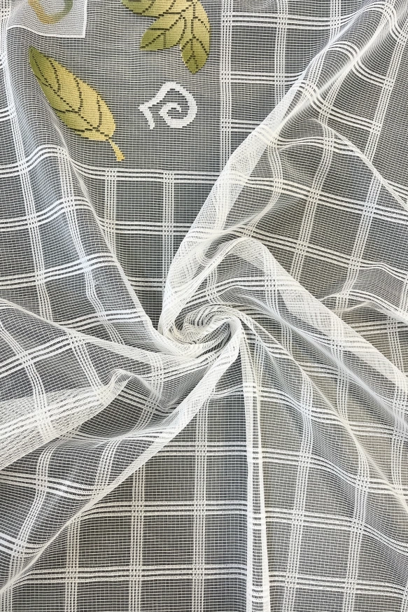 Tört fehér alapon zöld színű levélmintás függöny 